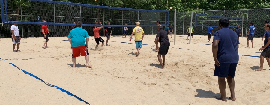 Railinc employees team up to play volleyball at lunch